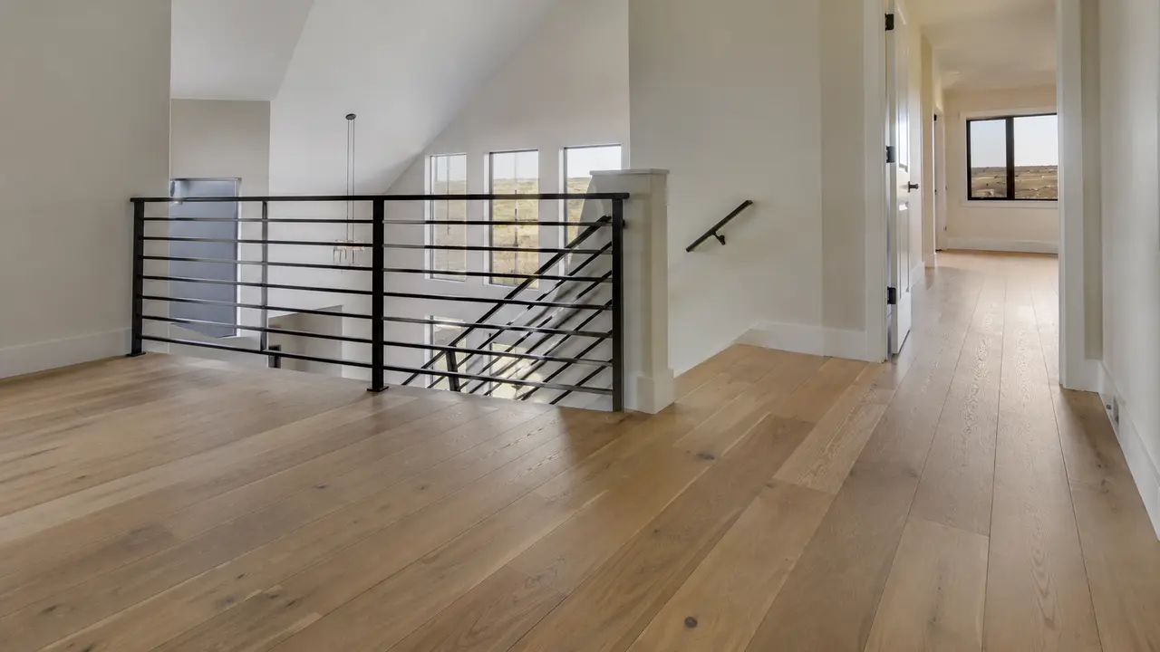 Finished oak floor and modern stair landing