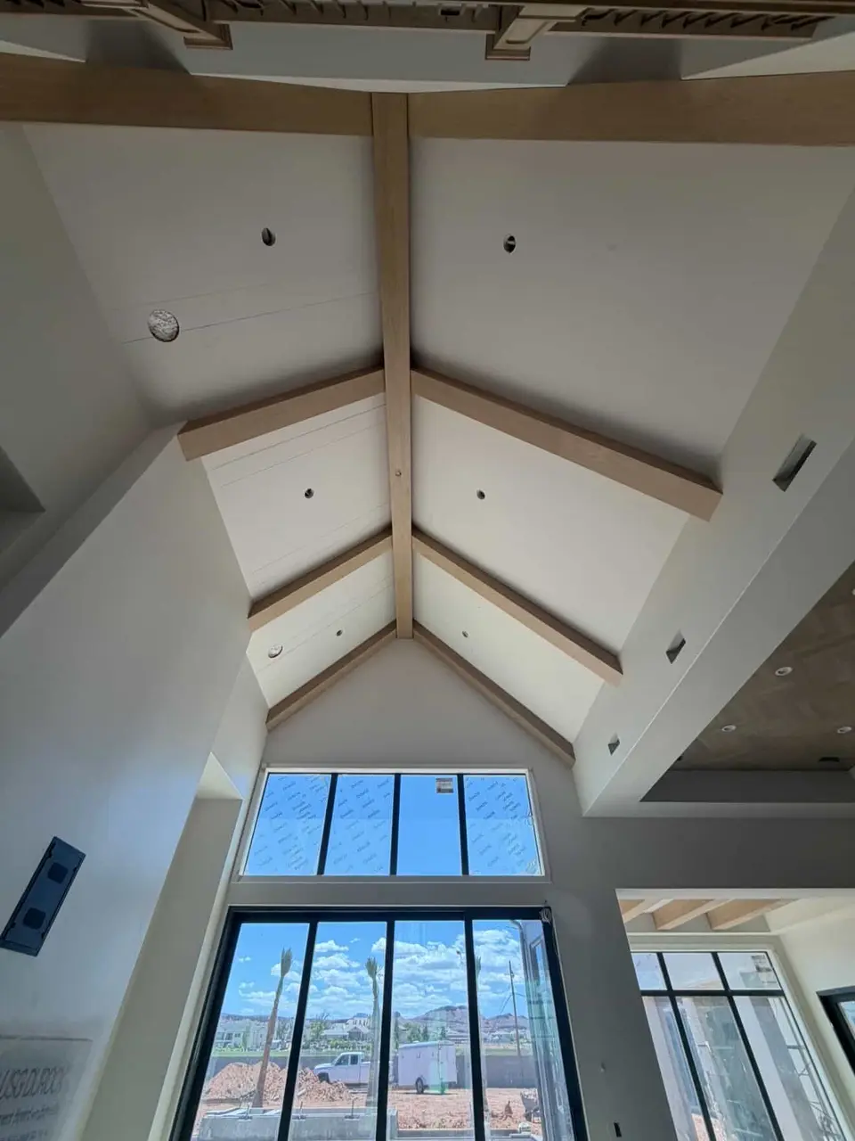 Vaulted ceiling beam installation in progress