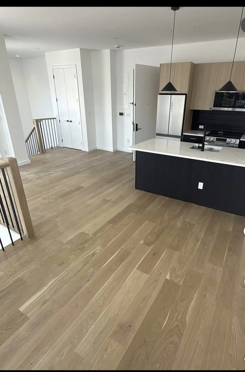 Finished oak flooring in a modern kitchen