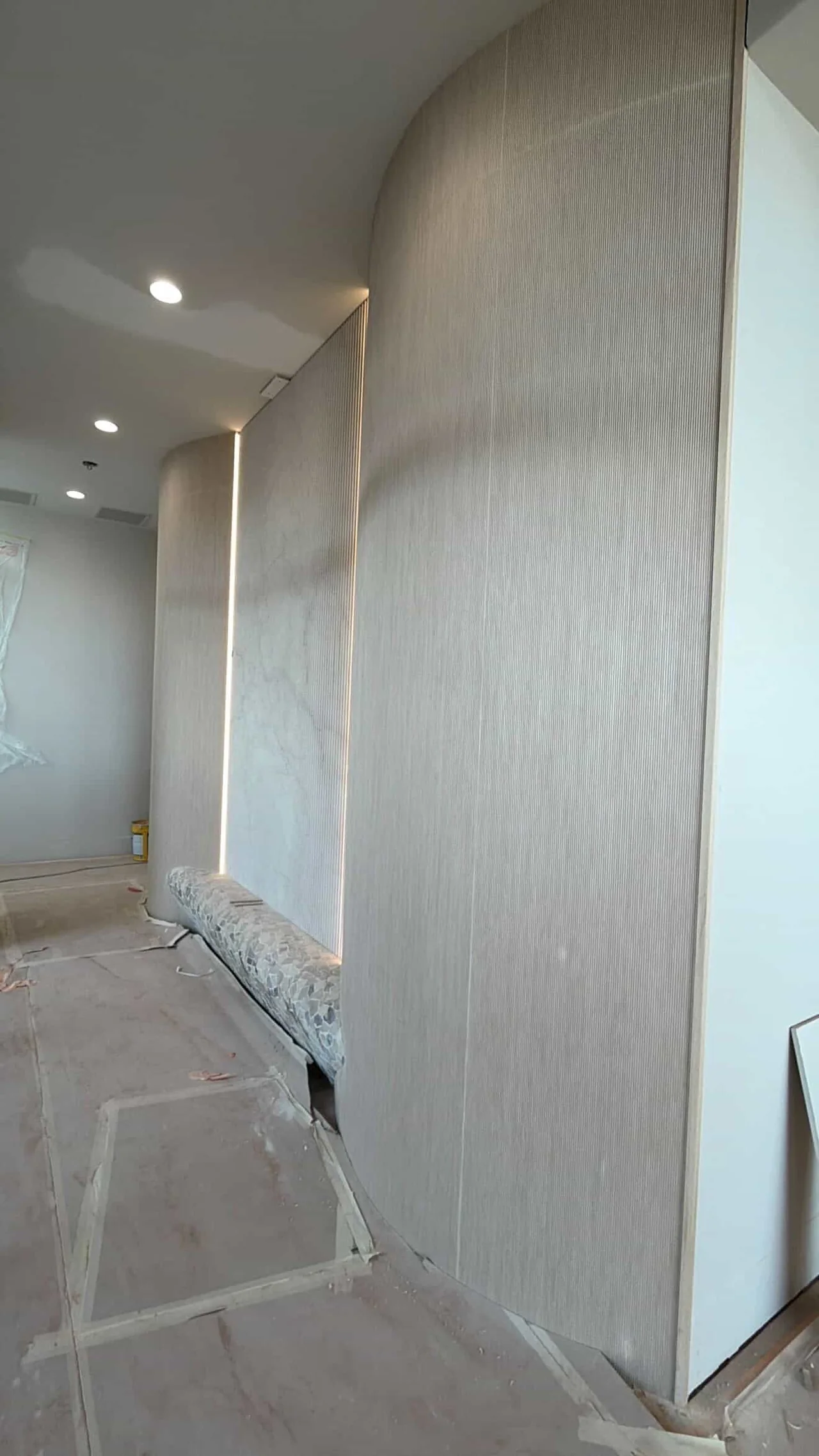 Curved custom wall with integrated seating