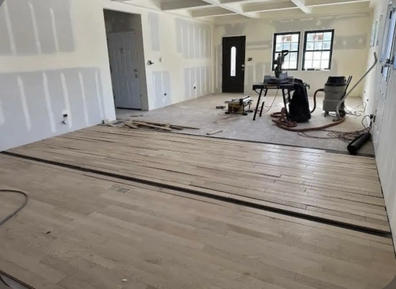 Wood flooring installation progress on site